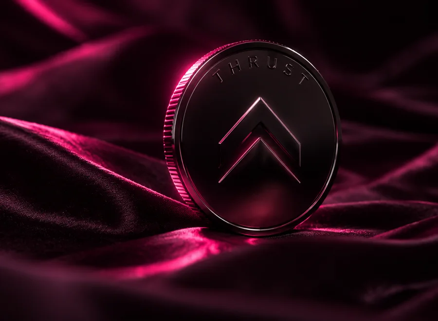 The THRUST token, a dark coin with a blue rim